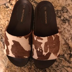 Pretty little thing cow print slides